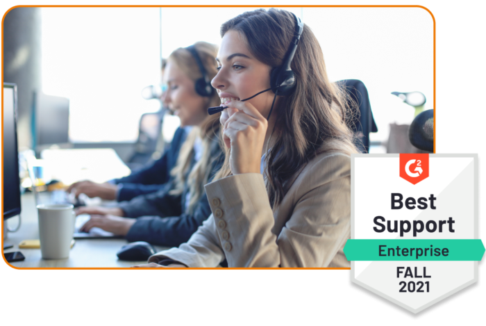 A support person taking customer calls with a headset A support person taking customer calls with a headset